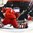 BUFFALO, NEW YORK - DECEMBER 30: The Czech Republic's Jakub Skarek #1 allows a third period goal to Igor Martynov #12 of Belarus while Marek Zachar #6 looks on during preliminary round action at the 2018 IIHF World Junior Championship. (Photo by Matt Zambonin/HHOF-IIHF Images)

